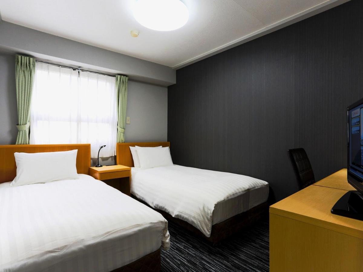 Business Hotel Sunpalace Tokyo Esterno foto