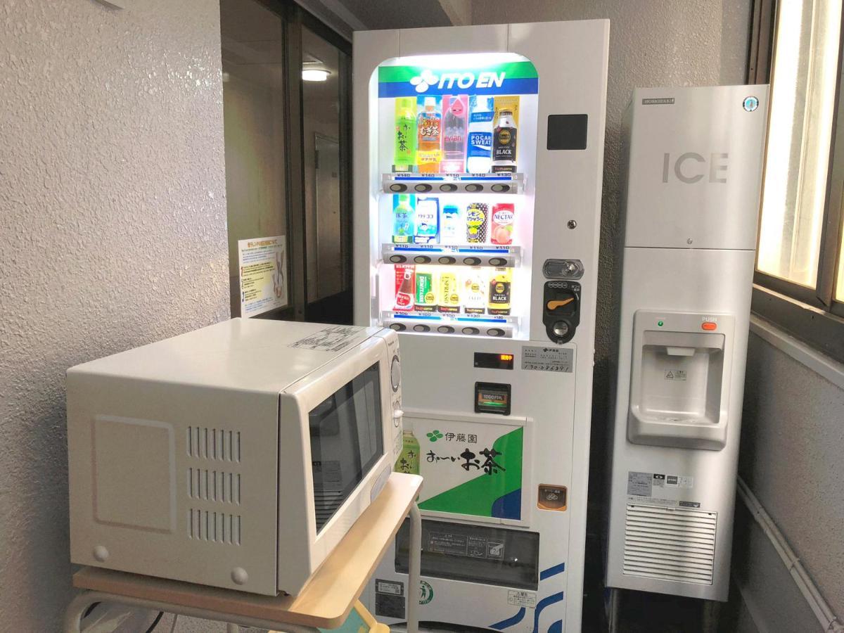 Business Hotel Sunpalace Tokyo Esterno foto