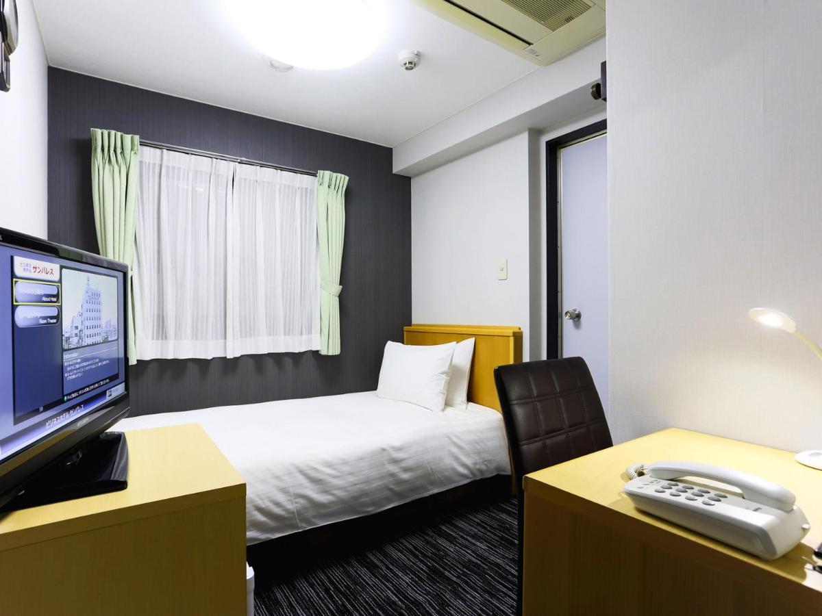 Business Hotel Sunpalace Tokyo Esterno foto