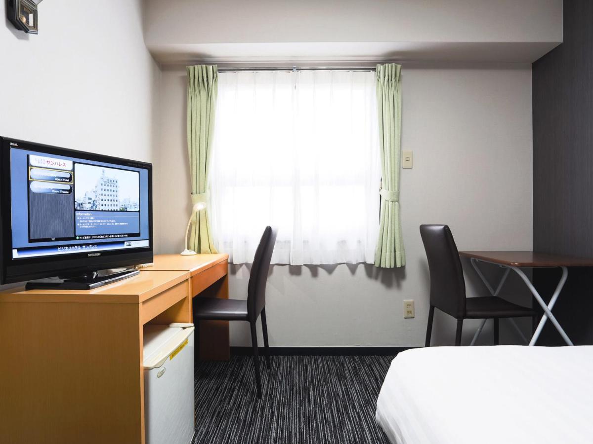 Business Hotel Sunpalace Tokyo Esterno foto