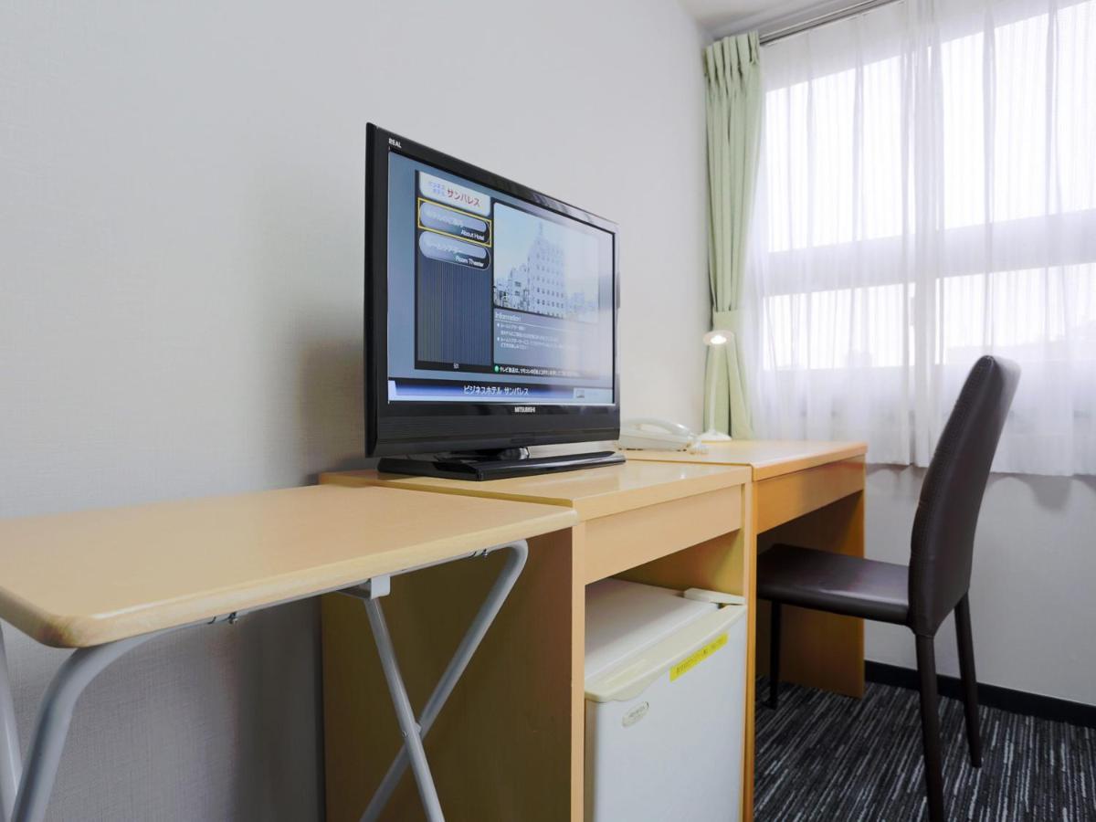 Business Hotel Sunpalace Tokyo Esterno foto