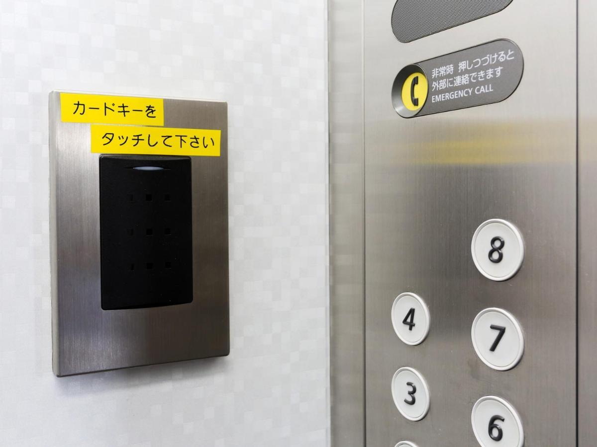 Business Hotel Sunpalace Tokyo Esterno foto