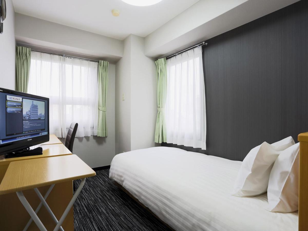 Business Hotel Sunpalace Tokyo Esterno foto